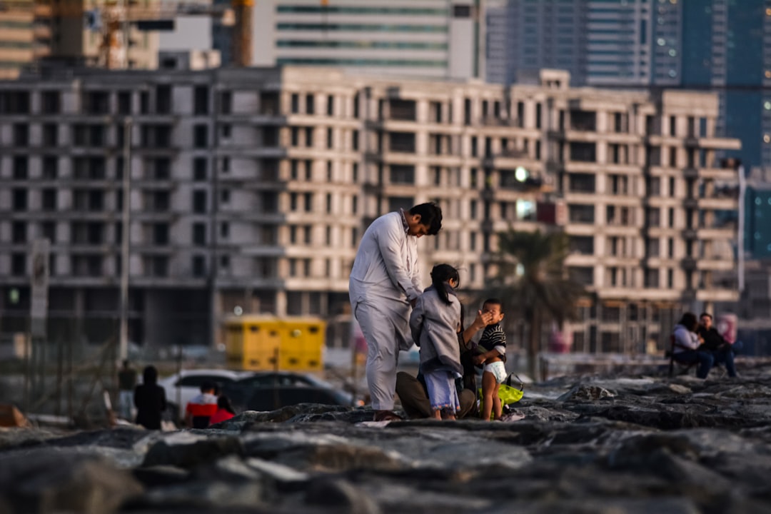 A group of people standing on top of a roof